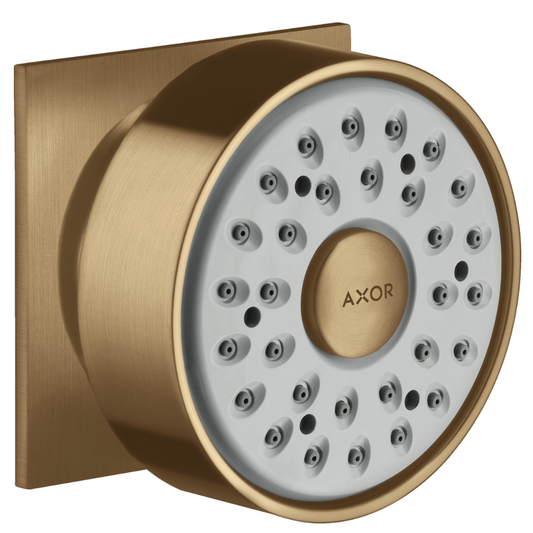 Gold AXOR shower head on a white background