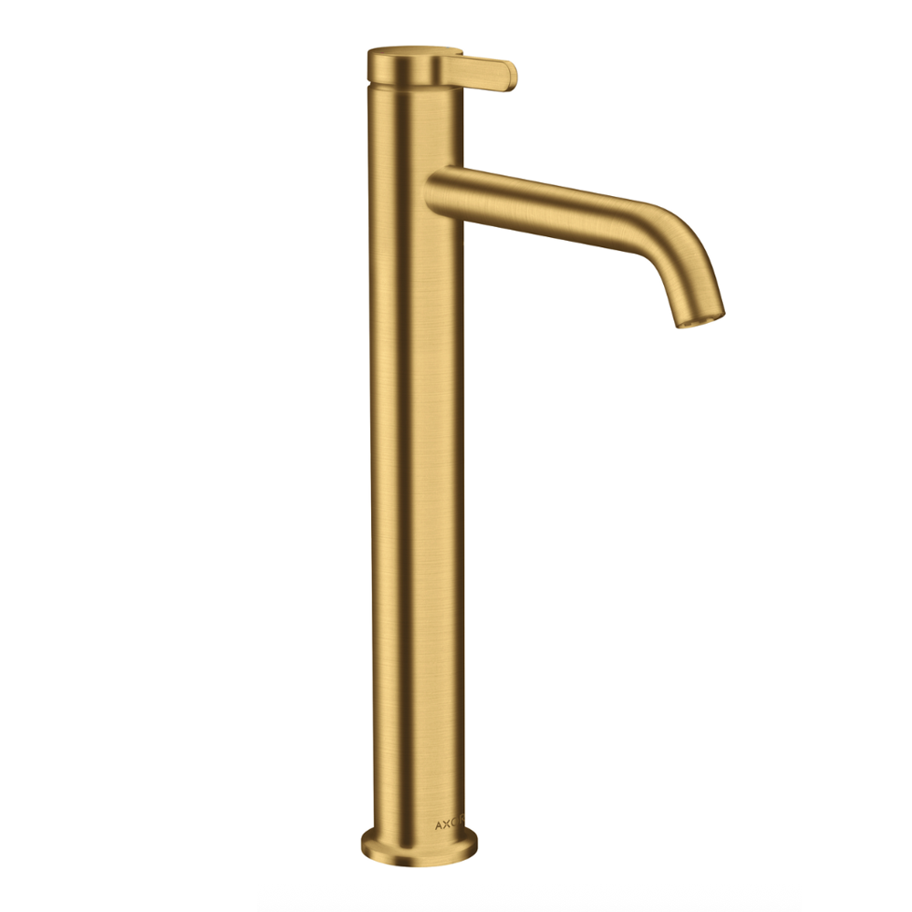 Gold faucet on a white background