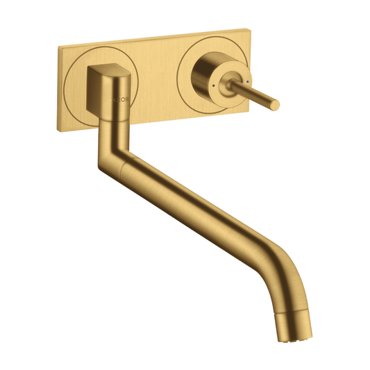Gold wall-mounted faucet on a white background