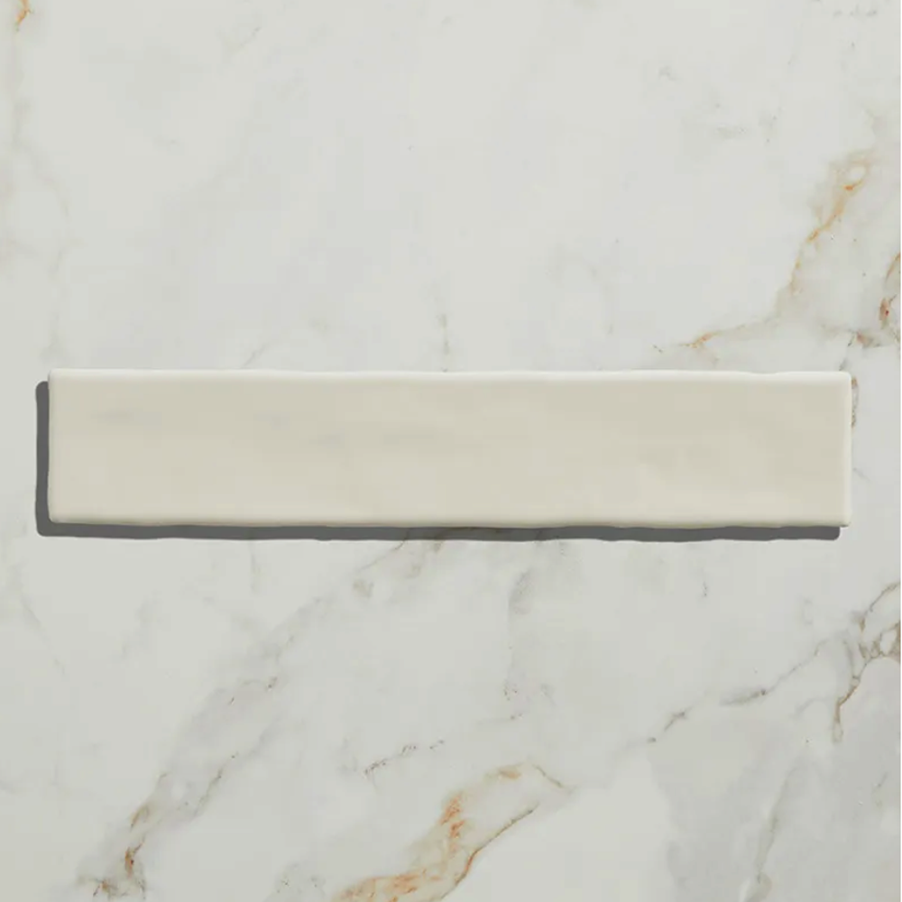 Rectangular tile with a white and beige gradient on a marble background Avebury Ceramic