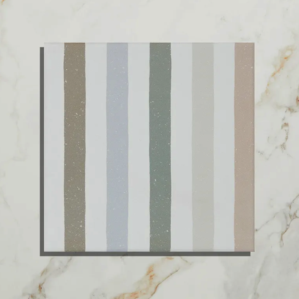 Striped fabric swatch on a marble background