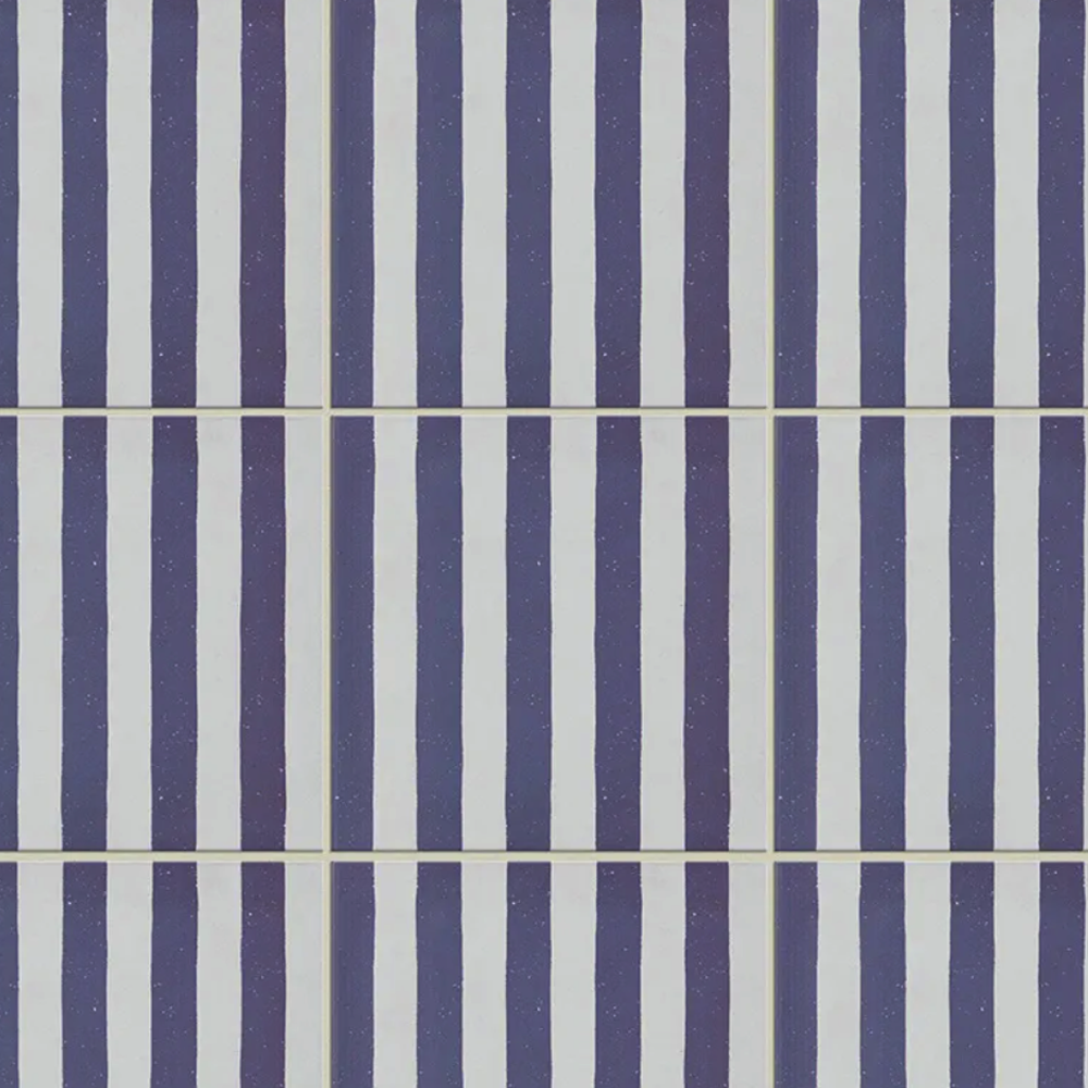 Pattern of blue and white vertical stripes on a tiled background