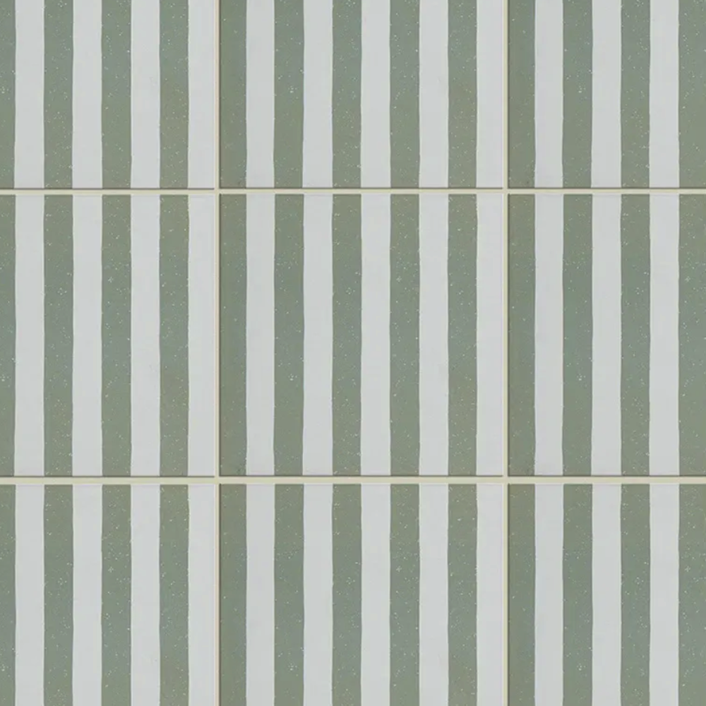 Pattern of green and white vertical stripes on a tiled background