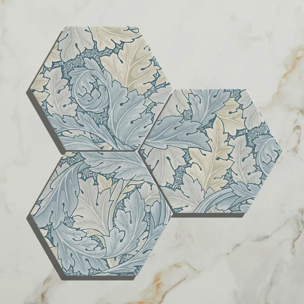 Hexagonal tiles with leaf pattern on a marble surface