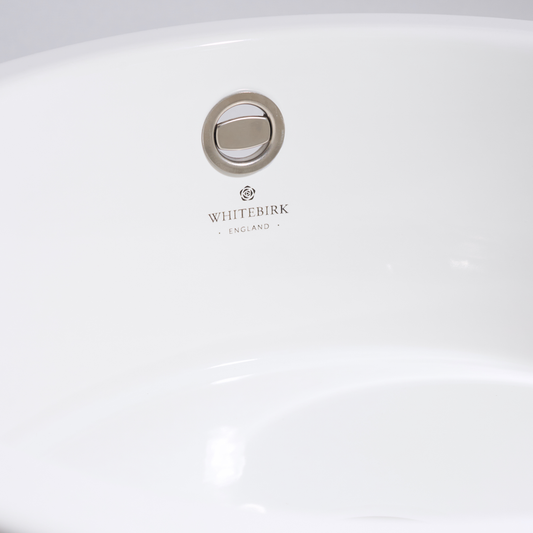 Close-up of a white product with 'Whitebirk' branding on a light gray background