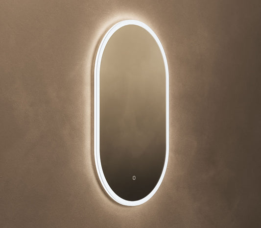 Origins Living Cleo Capsule LED Mirror in a bathroom setting