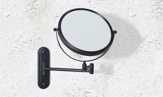 Origins Living Mason Reversible Magnifying Wall Mirror in a bathroom setting