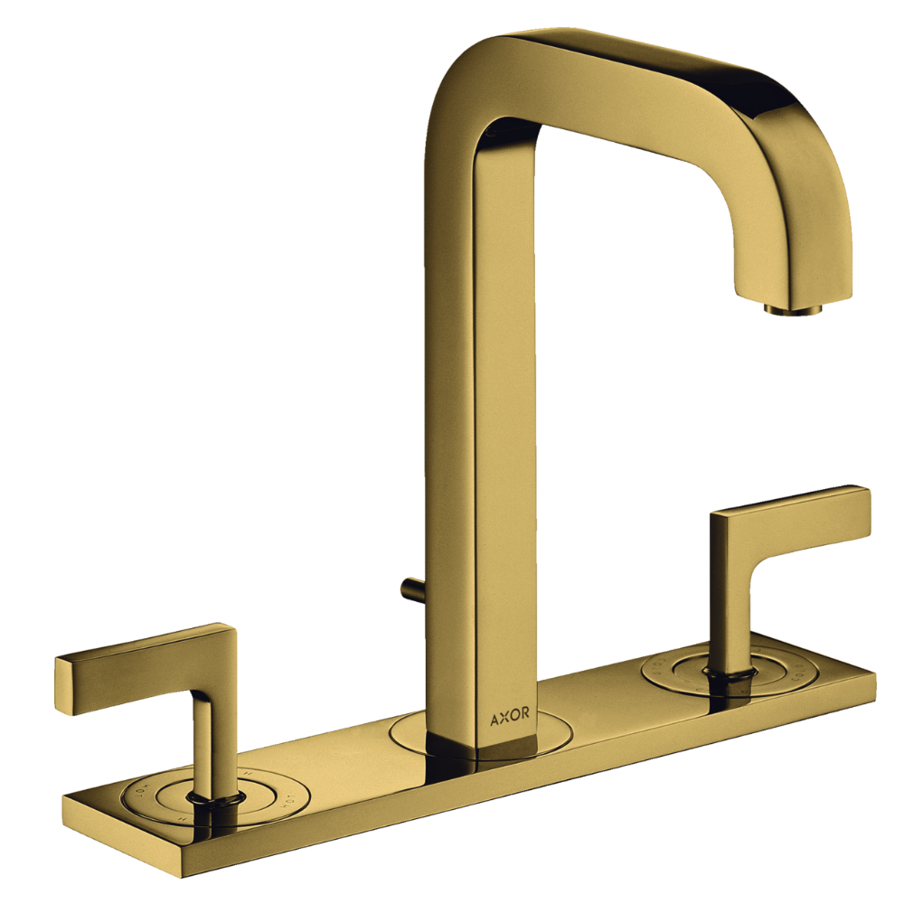 Gold faucet set on a white background