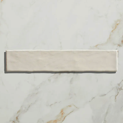 Rectangular marble tile on a marble surface