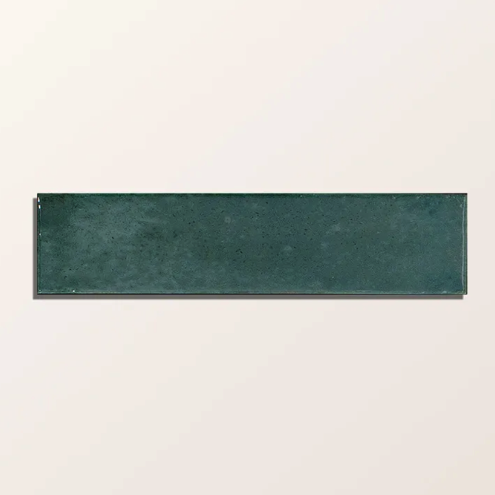 Rectangular green tile on a beige background
