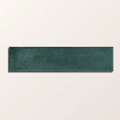 Rectangular green tile on a beige background