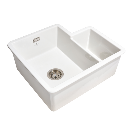 White kitchen sink with drain on a white background
