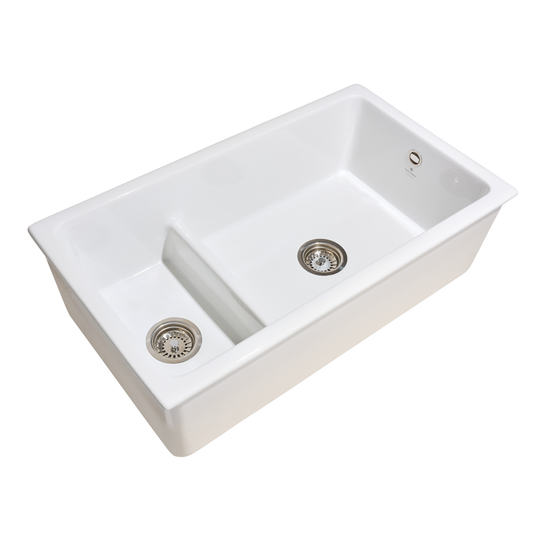 White kitchen sink with two drainboards on a white background