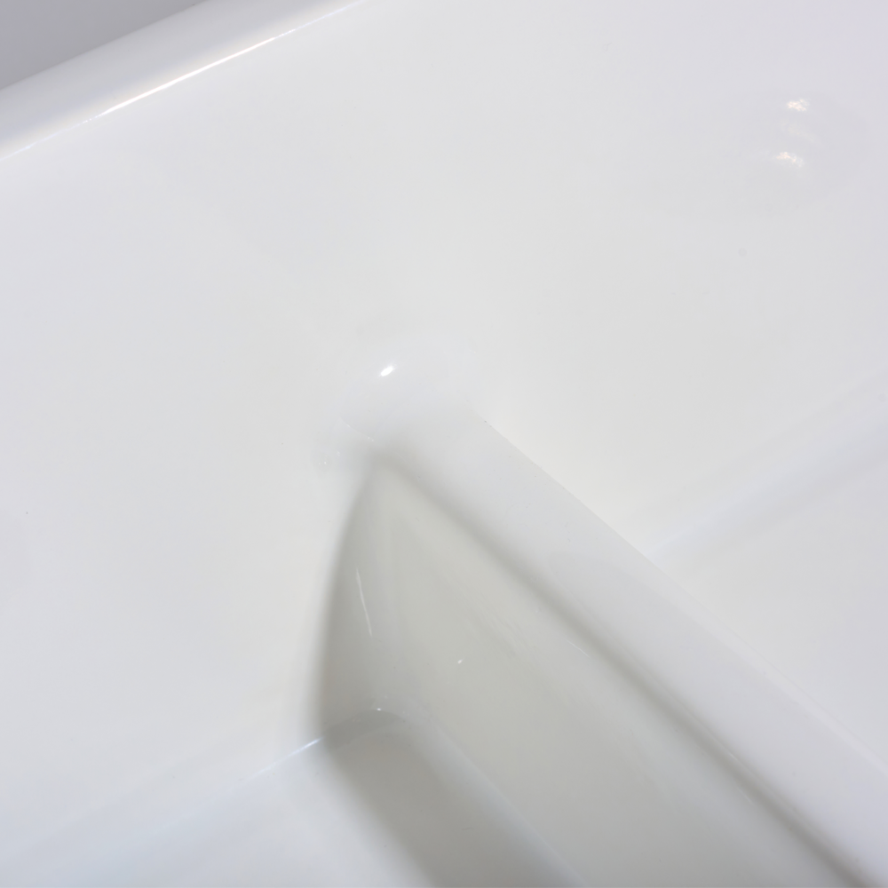 Close-up of a white hexagonal tile with a subtle pattern
