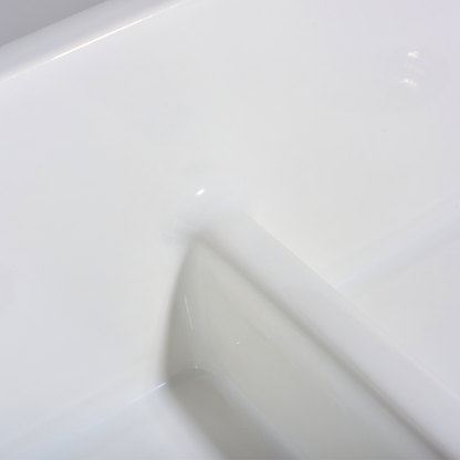 Close-up of a white hexagonal tile with a subtle pattern