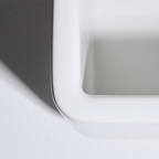 Close-up of a gray rectangular object on a white background