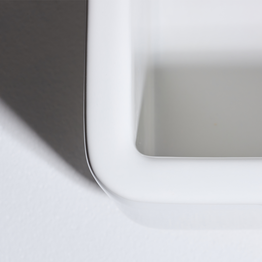 Close-up of a gray rectangular object on a white background
