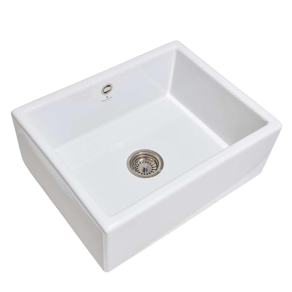 White kitchen sink with drain and faucet hole on a white background
