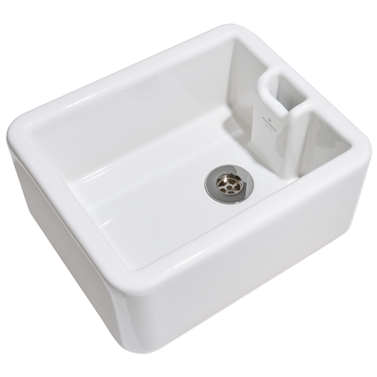 White ceramic kitchen sink on a white background