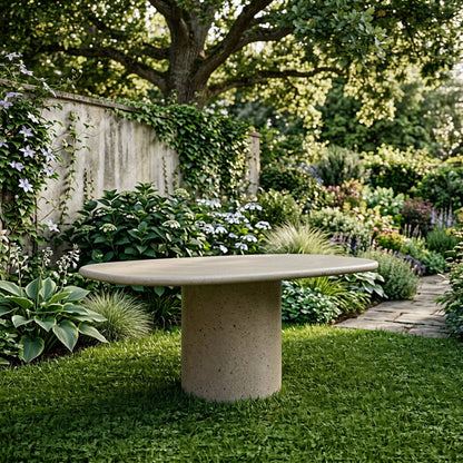 Microcement dining table in Hueso in a planted garden