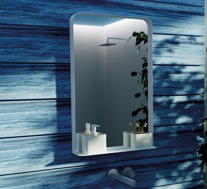 Origins Living City Mirror with Shelf in a bathroom setting