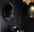 Origins Living City Round Mirror in a bathroom setting
