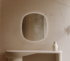 Origins Living Claris Curve Oblong LED Mirror in a bathroom setting