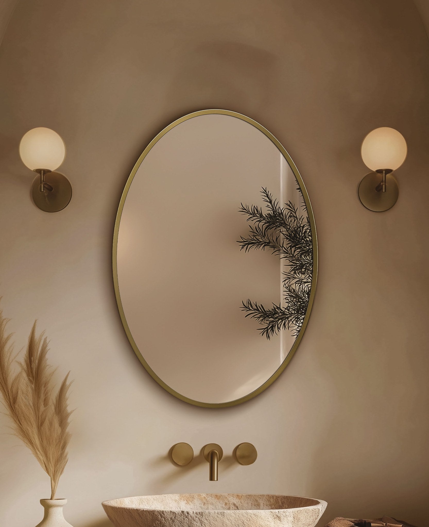 Origins Living Delphine Oval Mirror in a bathroom setting