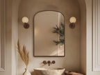 Origins Living Delphine Overmantel Arch 60 Mirror in a bathroom setting