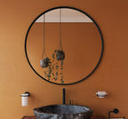 Origins Living Docklands Round Mirror in a bathroom setting