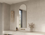 Origins Living Oslo Arch Mirror in a bathroom setting