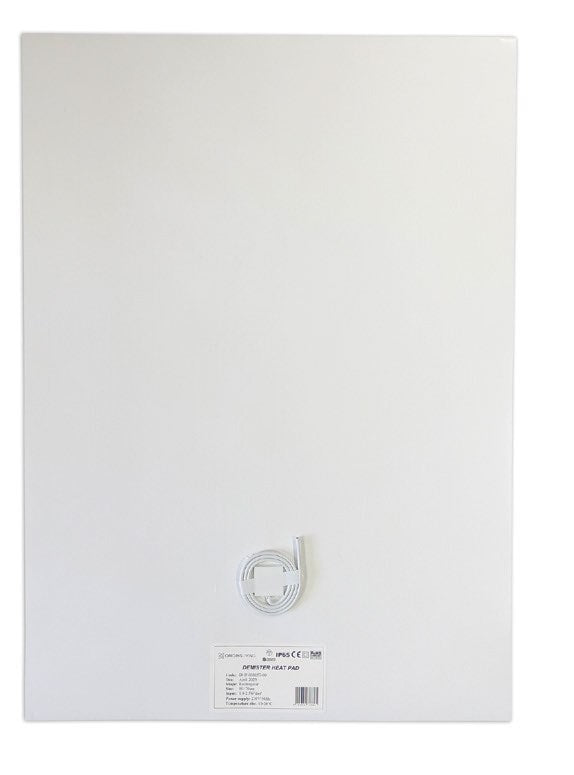 Origins Living Demister Heat Pad in a bathroom setting