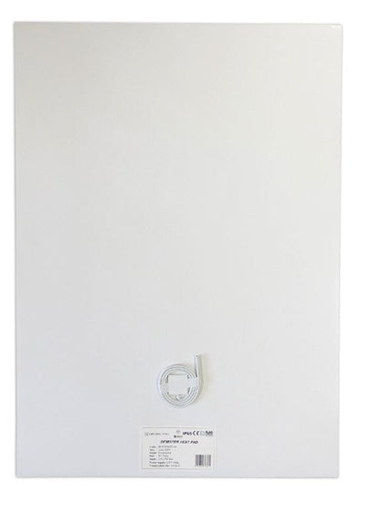 Origins Living Demister Heat Pad in a bathroom setting