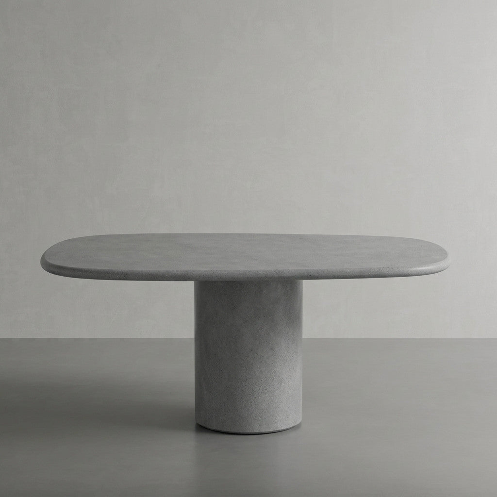 Microcement dining table in Azul, a cool grey-blue finish