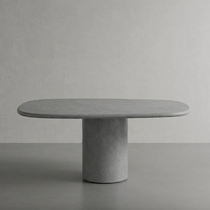 Microcement dining table in Azul, a cool grey-blue finish