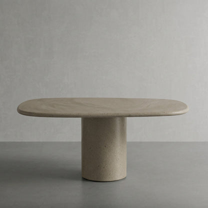 Microcement dining table in Hueso, a pale warm bone finish