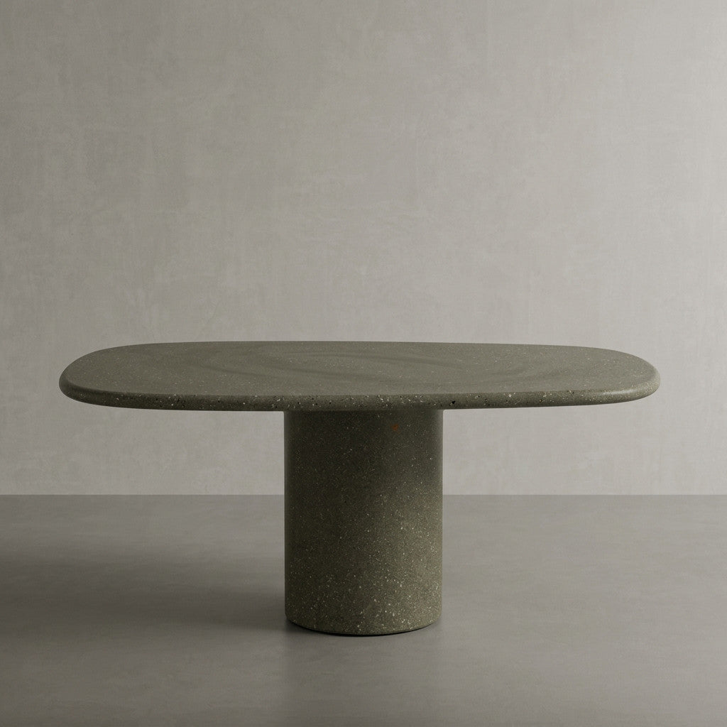Microcement dining table in Verde, a muted olive green finish