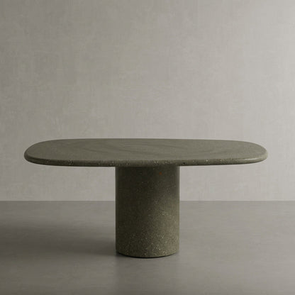 Microcement dining table in Verde, a muted olive green finish