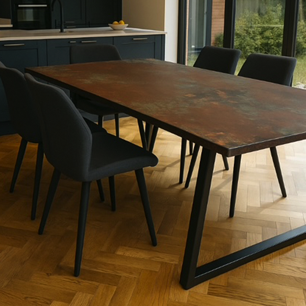 Oxidart liquid metal dining table, showing the depth and movement of the finish